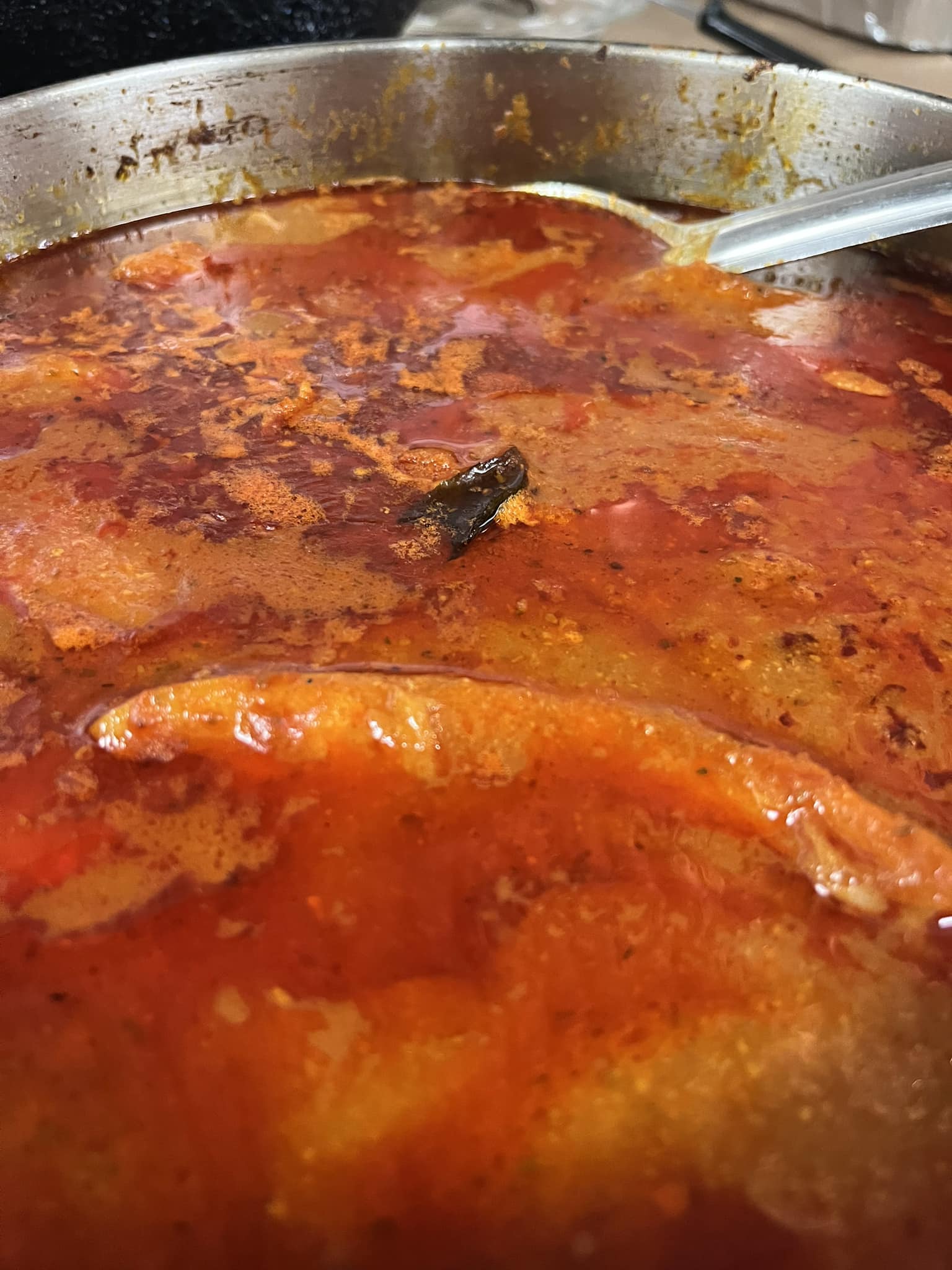 A large pot of curry simmering in the Desi Meal kitchen